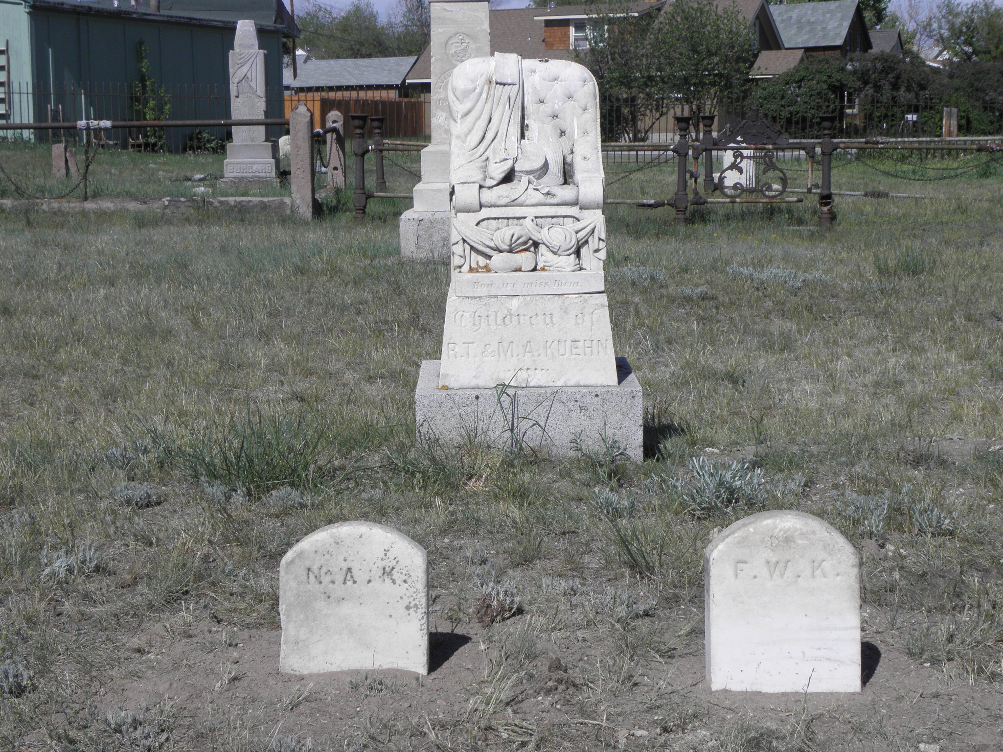 We identified and replaced as many footstones as possible. Kuehn, Norma Alada 1881-1885; Felix Warren 1884-1884 B11